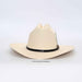 Beige cowboy hat with a black band on a white background