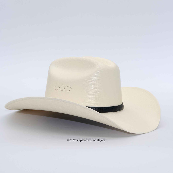 A light beige woven cowboy hat with a black band and a small geometric embroidered detail on the side, photographed on a light gray background.