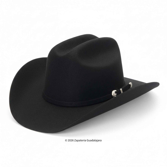 Black cowboy hat with a band on a white background