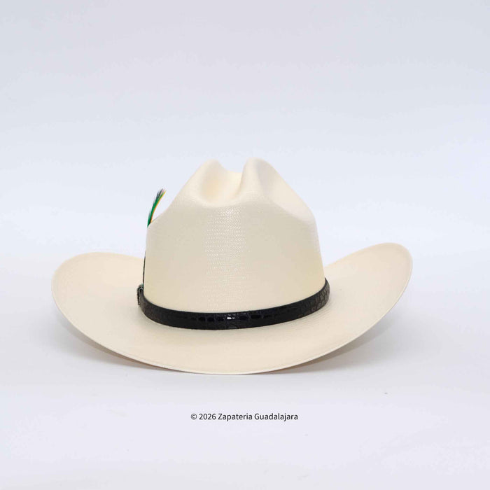 An off-white woven cowboy hat with a black band around the crown, photographed against a plain white background.
