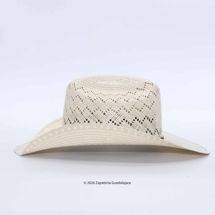 A light beige woven straw cowboy hat with a wide brim and a decorative openwork pattern on the crown, shown against a plain white background.