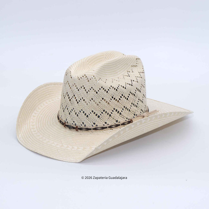 A light beige woven straw cowboy hat with a black dotted band and a brown leather detail, shown on a white background.