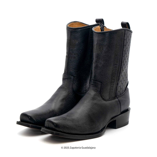 A pair of black cowboy boots with a 7 toe deer skin upper and a leather lining, featuring a visible zipper and a heel.