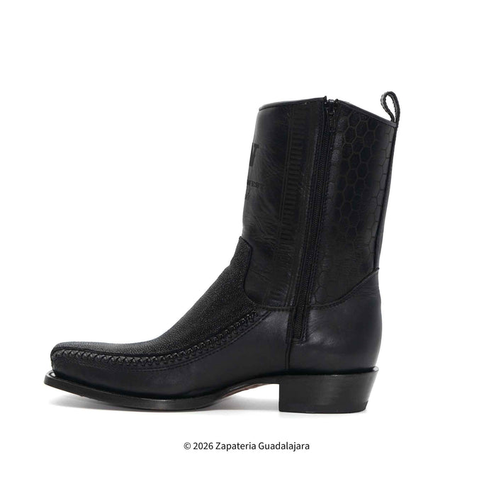 Black cowboy boot on a white background