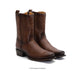 Pair of brown cowboy boots on a white background