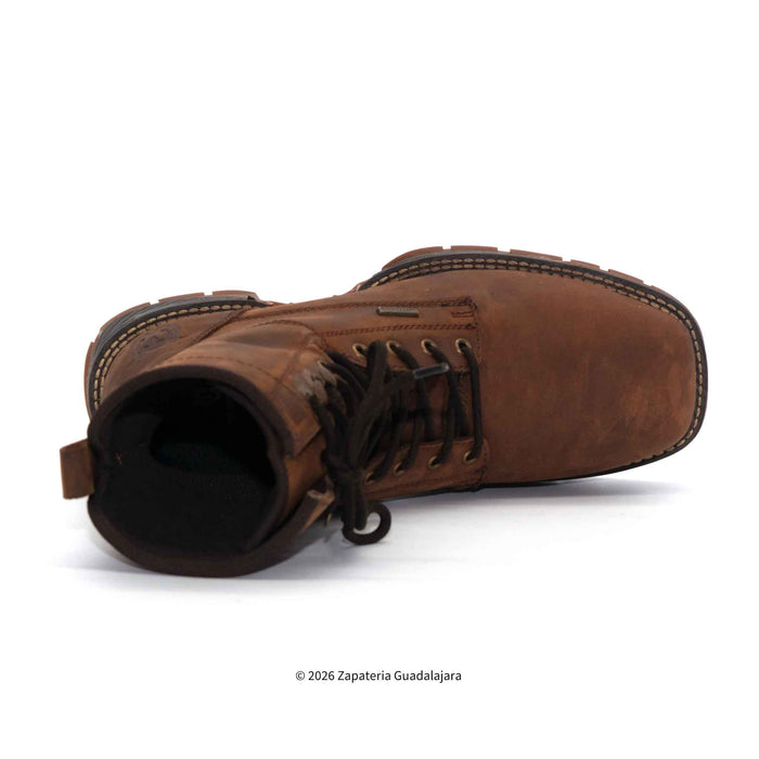 Brown leather boot on a white background