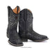 A pair of black western cowboy boots with a crocodile-embossed texture on the lower shaft and foot, featuring white embroidered scrollwork on the upper shafts, shown against a plain white background.