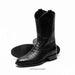 A pair of black crocodile-embossed leather cowboy boots, with one boot standing upright and the other lying flat to show the sole, on a white background.