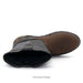 Brown leather boot with black sole on a white background