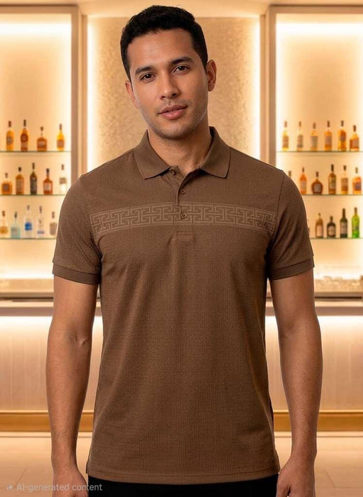 Man wearing a brown polo shirt in a bar setting