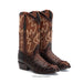 Brown cowboy boots with intricate designs on a white background