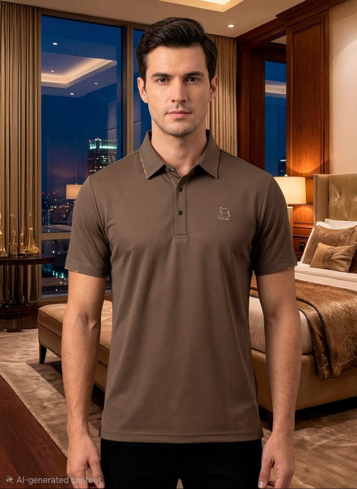 Man wearing a brown polo shirt in a luxurious bedroom setting