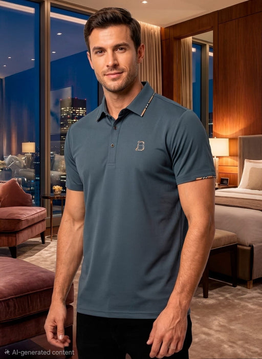 Man wearing a blue polo shirt in a modern living room setting