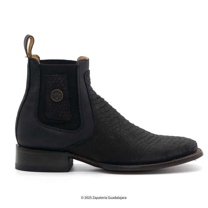 Black leather boot with a textured pattern on a white background