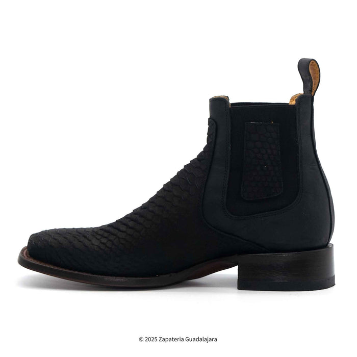 Black leather Chelsea boot on a white background
