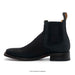 Black leather Chelsea boot on a white background
