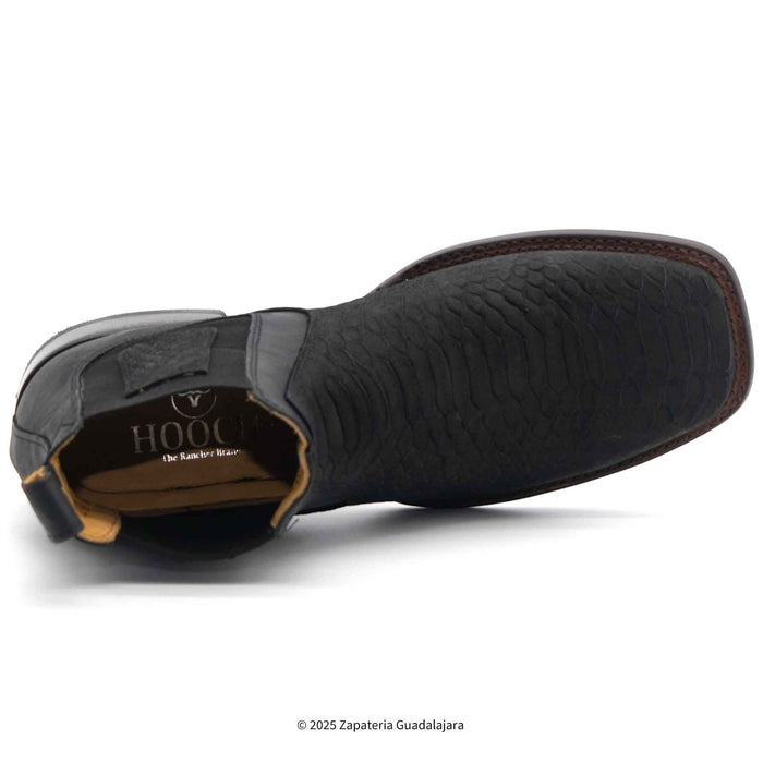 Black leather boot with brand logo on a white background