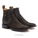 Pair of brown leather boots with a textured finish on a white background