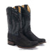 Pair of black cowboy boots with intricate design on a white background