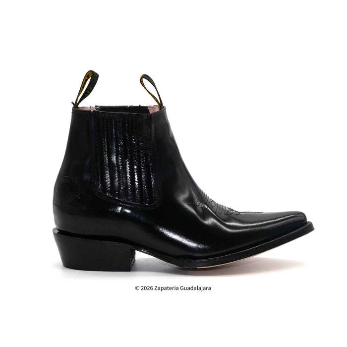 Black leather boot on a white background