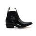 Black leather boot on a white background