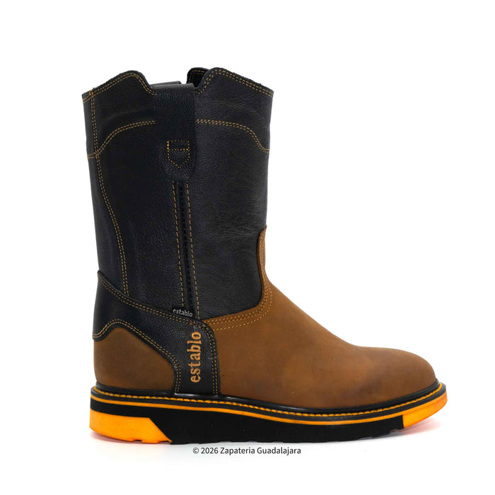 Brown and black cowboy boot with orange sole on a white background