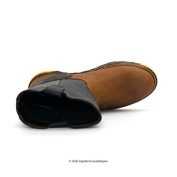 Brown and black boot on a white background