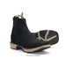 Black leather boot with tan sole on a white background
