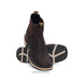 Brown leather boots with beige soles on a white background