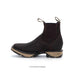 Brown leather boot with a white background