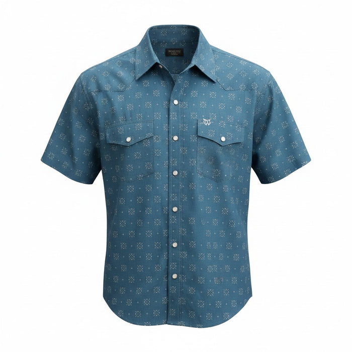 A short-sleeve western-style button-up shirt in slate blue with a repeating white geometric pattern, featuring two buttoned chest pockets and a white embroidered logo on the left chest, shown against a plain white background.