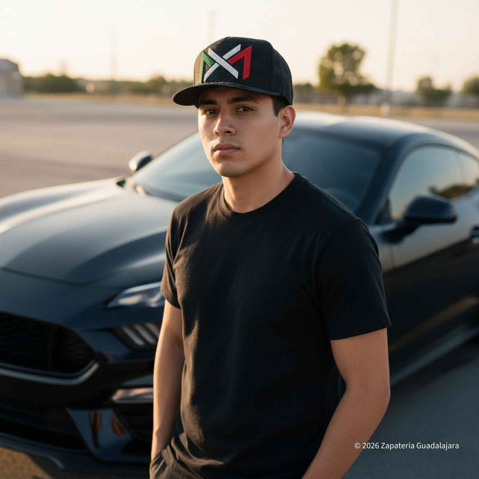 a young guy wearing a black cap with mexico tricolor embroidered with shinestones