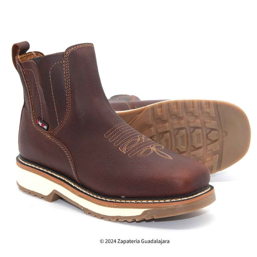 Brown leather boots with white soles on a white background