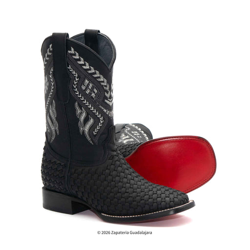 Black woven cowboy boot with red insole on a white background