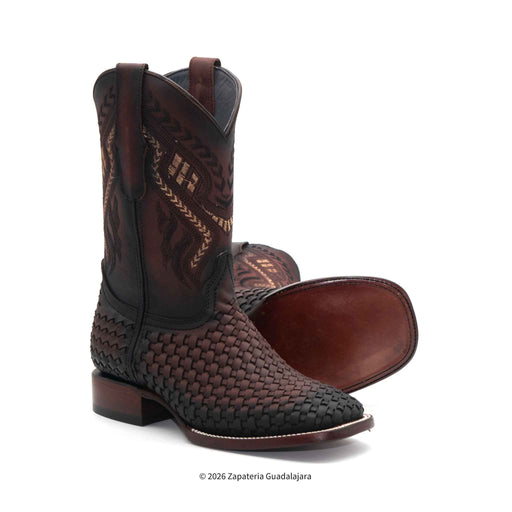 Brown woven cowboy boots on a white background
