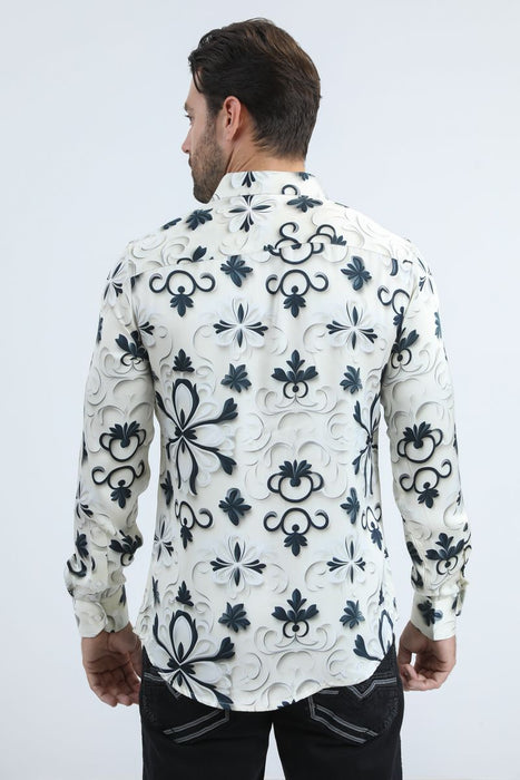 Man wearing a white shirt with black floral patterns on a white background