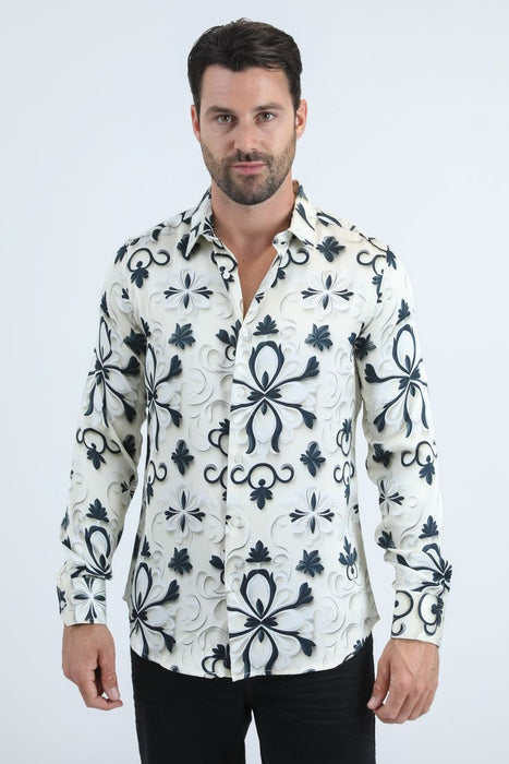 Man wearing a white shirt with black floral patterns on a white background