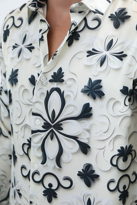 Close-up of a white shirt with black floral patterns