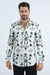 Man wearing a white shirt with black floral patterns on a white background