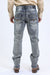 Person wearing light blue jeans on a white background