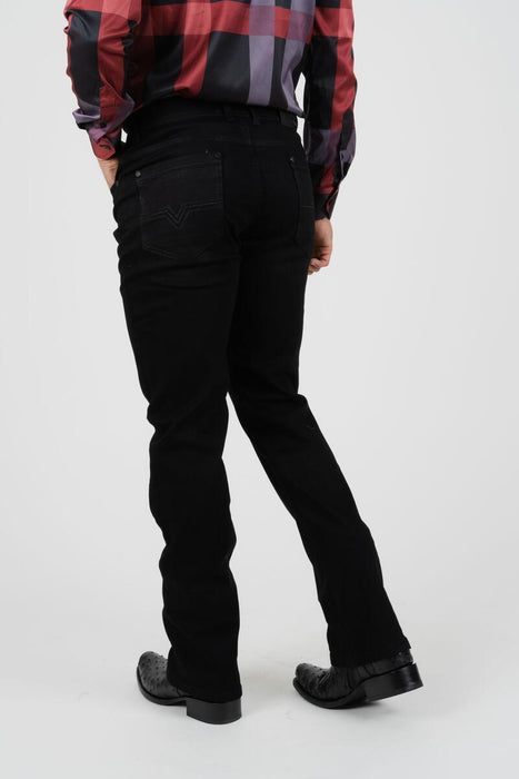 Person wearing black pants and a red plaid shirt on a white background