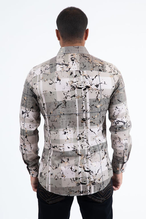Man wearing a patterned shirt with a white background