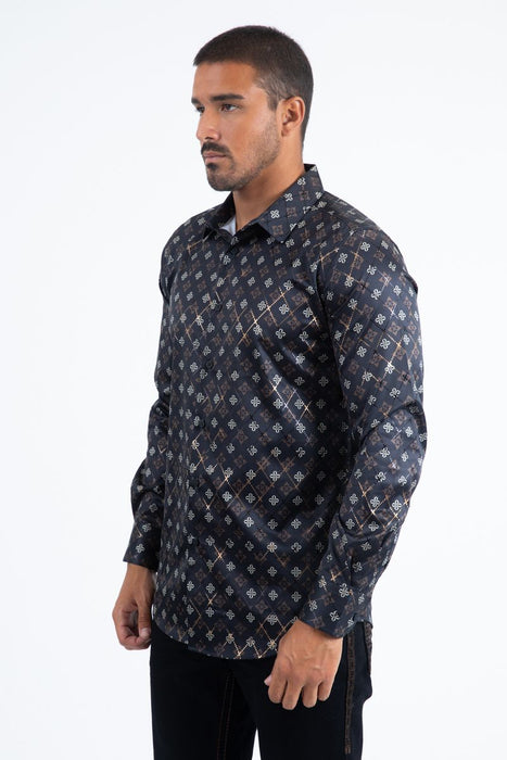 Man wearing a patterned shirt on a white background
