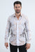 Man wearing a patterned shirt on a white background