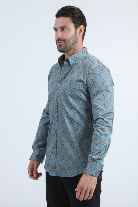 Man wearing a blue patterned shirt on a white background