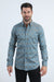 Man wearing a blue patterned shirt on a white background