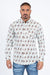 Man wearing a patterned shirt and jeans on a white background