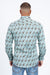 Man wearing a patterned shirt with a white background