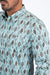 Man wearing a light blue patterned shirt with a collar.