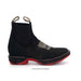 Black ankle boot with red sole on a white background